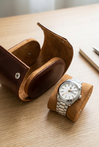 Brown 1-watch roll open with its removable pillow and watch taken out