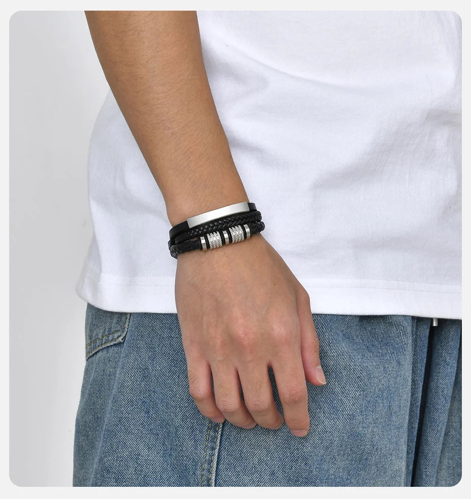Steel & Black engraved bracelet worn on the wrist